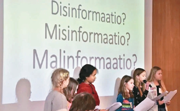 赫爾辛基的小學老師向學生解釋錯誤資訊（misinformation）、不實資訊（disinformation）和惡意訊息（malinformation）的差異。圖／衛報